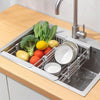 Space-saving expandable stainless steel sink dish rack multi-layer drain basket for placing dishes and cups.