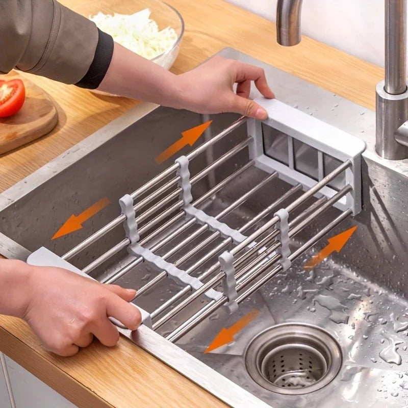 Space-saving expandable stainless steel sink dish rack multi-layer drain basket for placing dishes and cups.