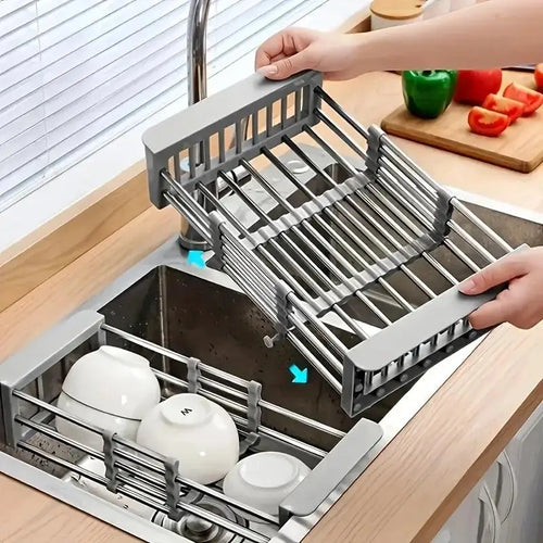 Space-saving expandable stainless steel sink dish rack multi-layer drain basket for placing dishes and cups.