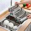 Space-saving expandable stainless steel sink dish rack multi-layer drain basket for placing dishes and cups.