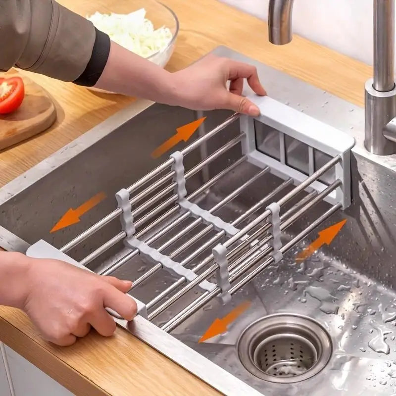 Space-saving expandable stainless steel sink dish rack multi-layer drain basket for placing dishes and cups.