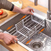Space-saving expandable stainless steel sink dish rack multi-layer drain basket for placing dishes and cups.
